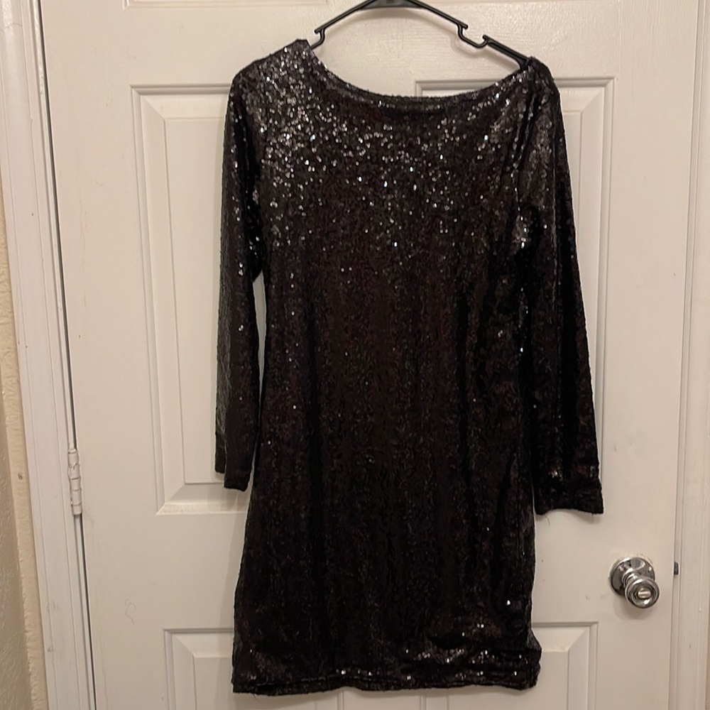 Black sequins long sleeve above knee with a ‘V’ back dress
